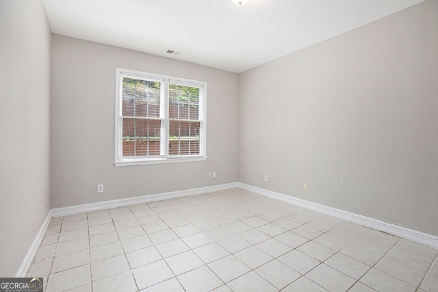 4609 Mctyre Way NW, Marietta, GA 30064 - empty room with baseboards and light tile patterned floors