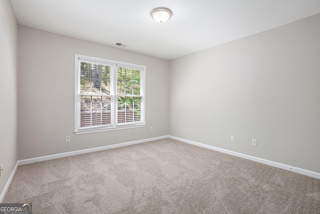 4609 Mctyre Way NW, Marietta, GA 30064 - carpeted empty room featuring baseboards