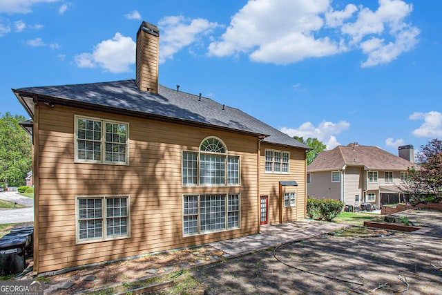 4609 Mctyre Way NW, Marietta, GA 30064 - rear view of house featuring a patio and a chimney
