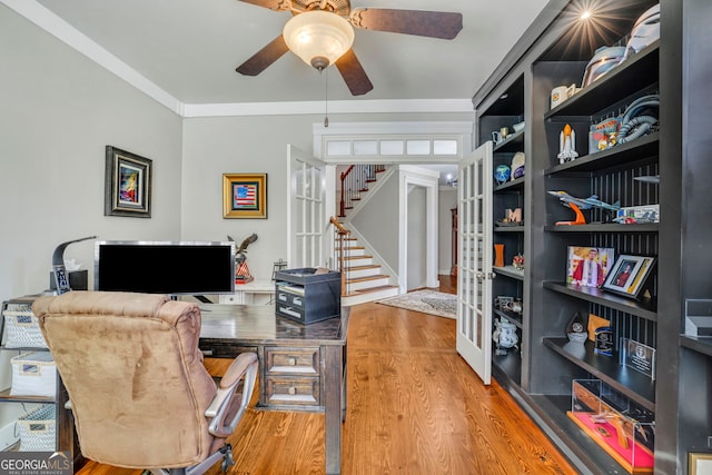 office area with french doors, ceiling fan, and wood finished floors