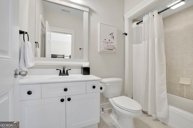 full bathroom with visible vents, tile patterned flooring, shower / tub combo, vanity, and toilet