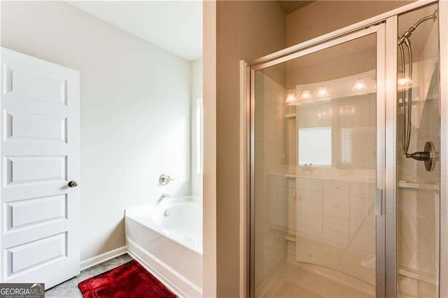 2316 Hastings Manor Ln, Hampton, GA 30228 - full bath featuring a garden tub and a stall shower