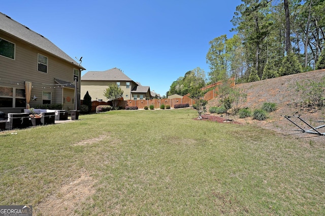 view of yard with fence