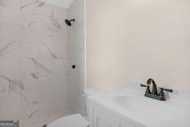 930 Burney Branch Cir, Blackshear, GA 31516 - full bathroom featuring vanity, a tile shower, and toilet
