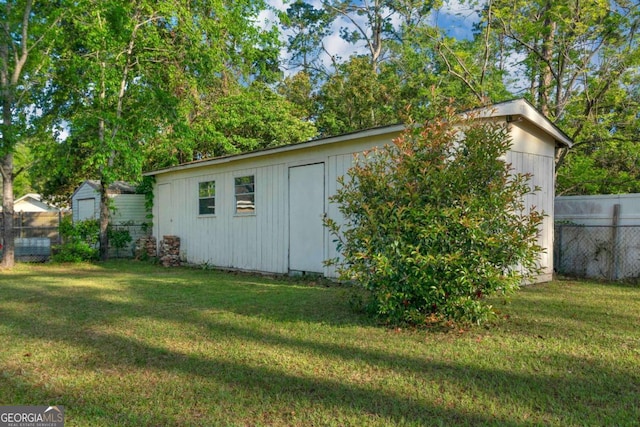 930 Burney Branch Cir, Blackshear, GA 31516 - view of outbuilding featuring an outdoor structure and fence