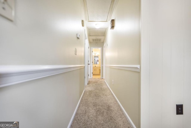 2237 W Elm St, Wrightsville, GA 31096 - corridor featuring visible vents, attic access, baseboards, and carpet flooring