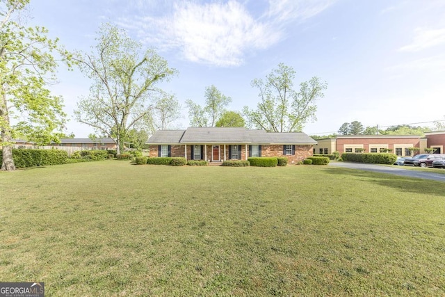 2237 W Elm St, Wrightsville, GA 31096 - ranch-style house with a front lawn