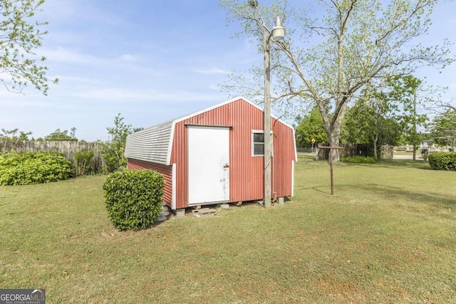 2237 W Elm St, Wrightsville, GA 31096 - view of shed with fence