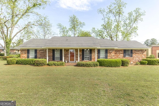 2237 W Elm St, Wrightsville, GA 31096 - ranch-style house with a front lawn and brick siding