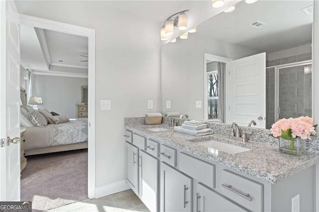 ensuite bathroom featuring baseboards, a stall shower, tile patterned floors, connected bathroom, and visible vents