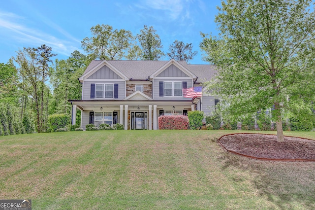 185 Discovery Lake Dr, Fayetteville, GA 30215 - craftsman-style home featuring a front yard, board and batten siding, and covered porch