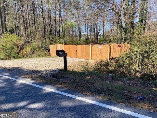 view of street with a gate