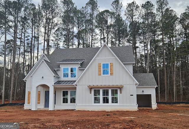 8415 Beryl Overlook, Gainesville, GA 30506 - view of front of property with a shingled roof, a standing seam roof, metal roof, and board and batten siding