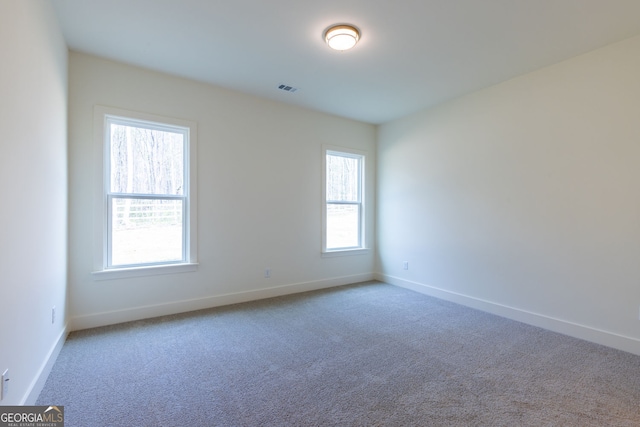 8415 Beryl Overlook, Gainesville, GA 30506 - carpeted empty room featuring baseboards and plenty of natural light