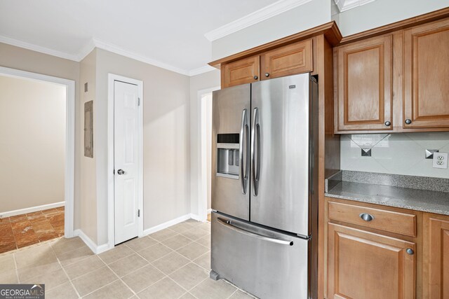 2404 Northlake Ct, Atlanta, GA 30345 - kitchen featuring stainless steel fridge with ice dispenser, baseboards, ornamental molding, backsplash, and brown cabinetry