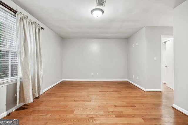2404 Northlake Ct, Atlanta, GA 30345 - unfurnished room with light wood-style floors, visible vents, and baseboards