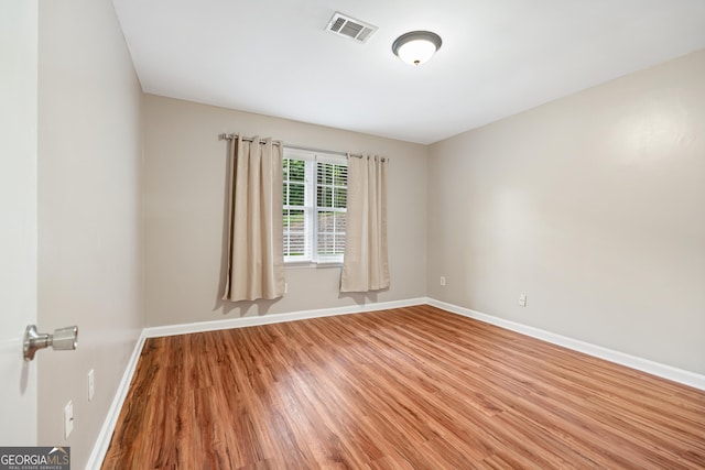 2404 Northlake Ct, Atlanta, GA 30345 - spare room with visible vents, baseboards, and light wood-style floors