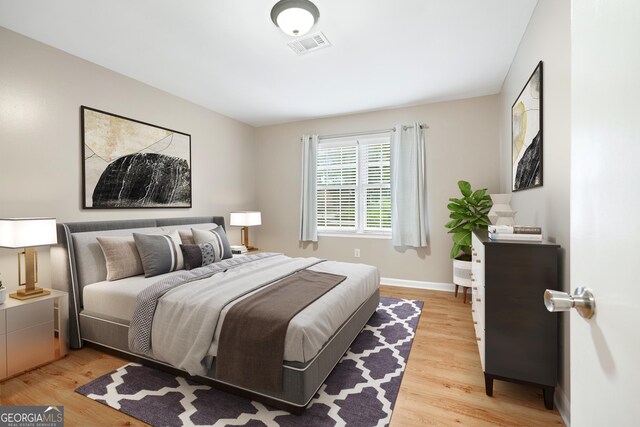 2404 Northlake Ct, Atlanta, GA 30345 - bedroom with visible vents, light wood-type flooring, and baseboards