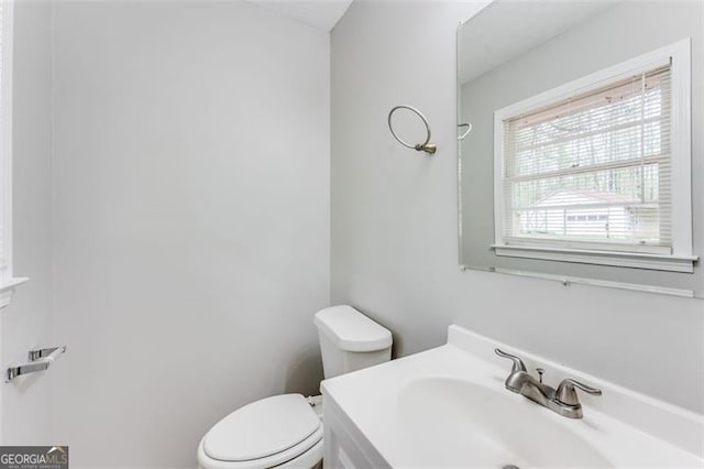 bathroom featuring a sink and toilet