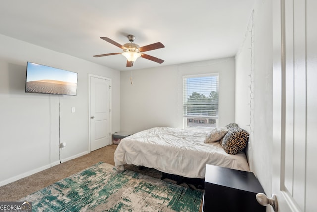 3464 Enterkin Ln, Atlanta, GA 30349 - carpeted bedroom featuring baseboards and ceiling fan