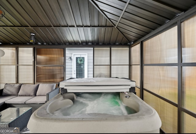 3464 Enterkin Ln, Atlanta, GA 30349 - sunroom / solarium with a hot tub and an outdoor living space