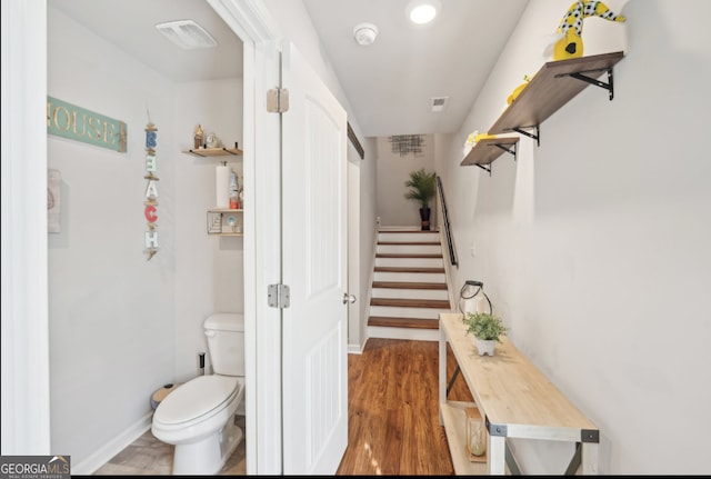 3464 Enterkin Ln, Atlanta, GA 30349 - stairway featuring wood finished floors and baseboards