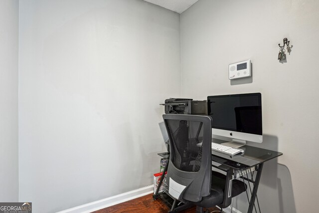 161 Hunters Chase, Mcdonough, GA 30253 - home office featuring baseboards and dark wood finished floors