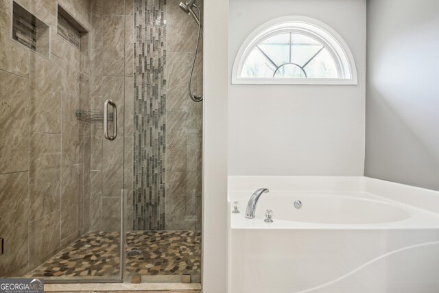 161 Hunters Chase, Mcdonough, GA 30253 - full bathroom with a bath and a stall shower