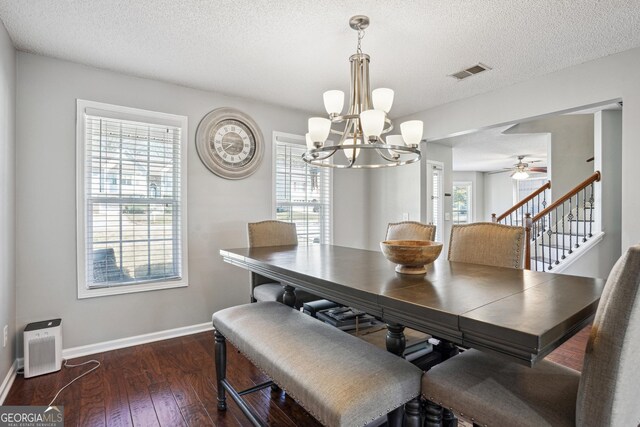 161 Hunters Chase, Mcdonough, GA 30253 - dining space with dark wood-type flooring, visible vents, baseboards, and a healthy amount of sunlight