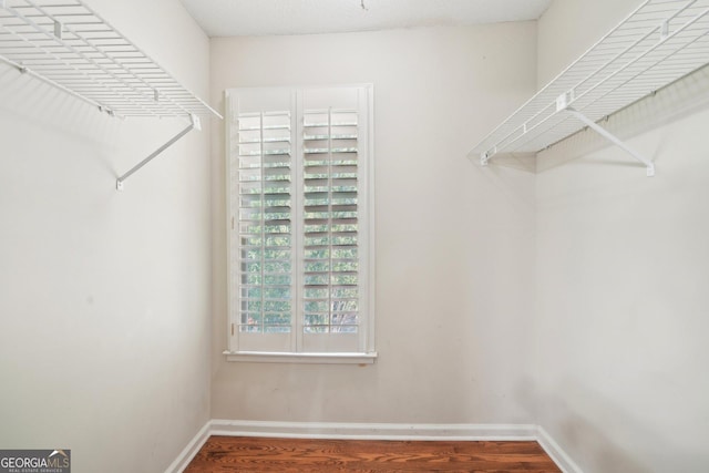 171 Riverview Trl, Roswell, GA 30075 - spacious closet featuring wood finished floors