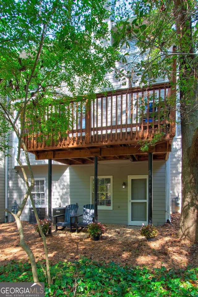 171 Riverview Trl, Roswell, GA 30075 - rear view of house with a deck