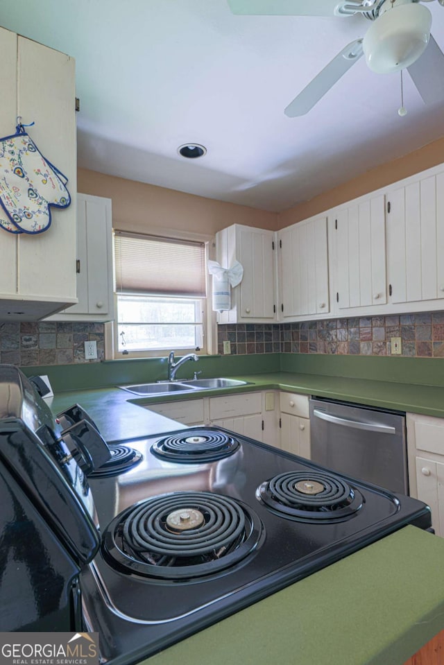 kitchen with white cabinets, stainless steel dishwasher, and a sink