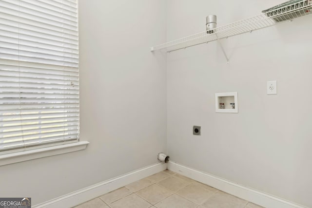 113 Highgrove Pl, Mcdonough, GA 30253 - washroom with baseboards, light tile patterned floors, hookup for a washing machine, laundry area, and electric dryer hookup
