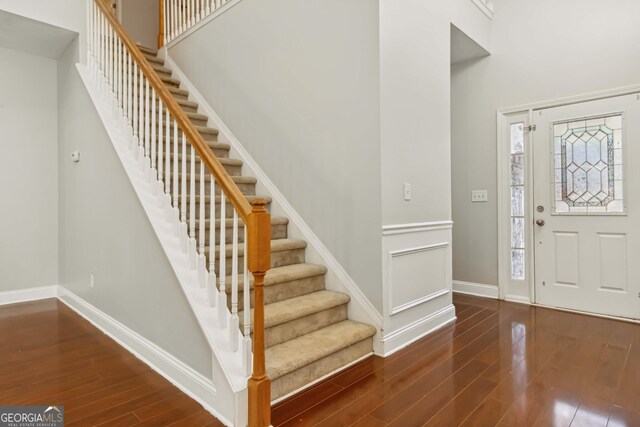 113 Highgrove Pl, Mcdonough, GA 30253 - entryway with stairs, baseboards, and wood finished floors