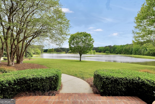 view of yard with a water view