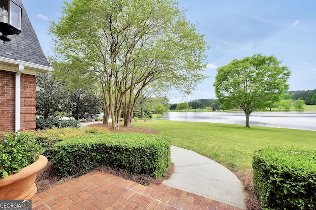 view of yard with a water view