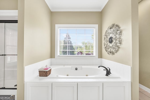 bathroom with a shower with shower door, crown molding, and a tub with jets