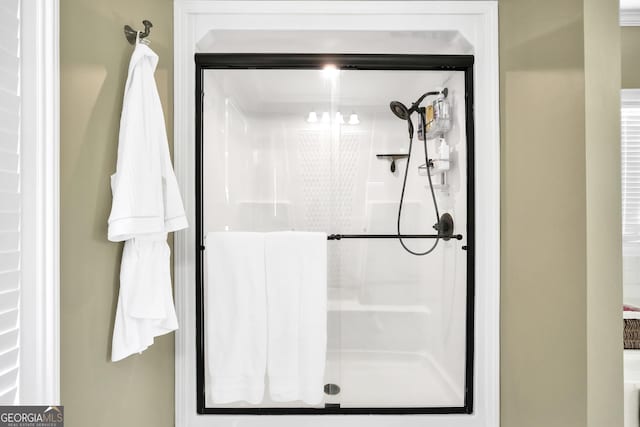 full bathroom with a stall shower