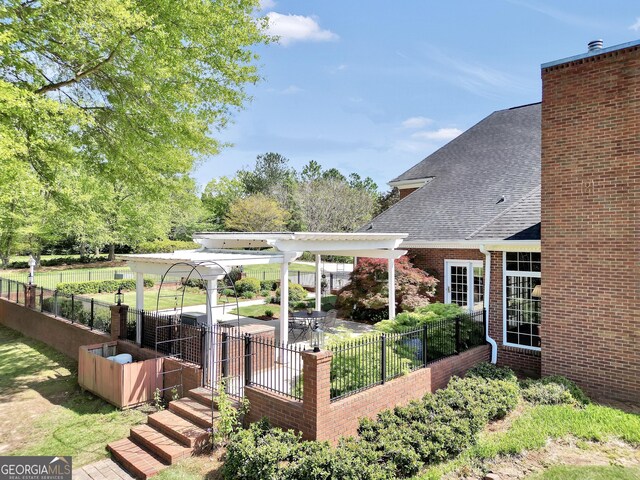 view of yard featuring a patio area and fence