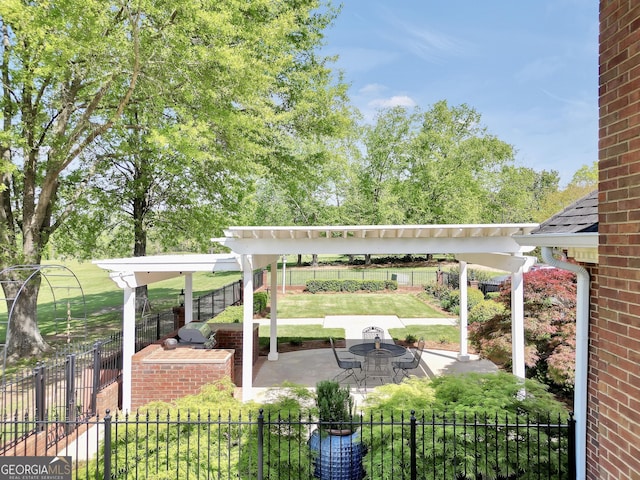 view of yard with a patio, fence private yard, and a pergola