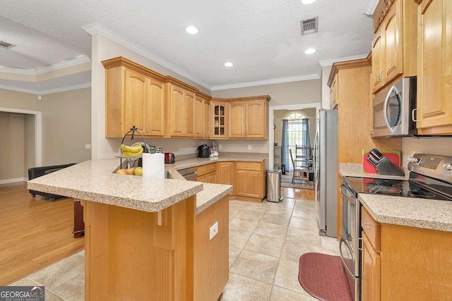 145 Spring Lake Cir, Brunswick, GA 31525 - kitchen featuring glass insert cabinets, ornamental molding, appliances with stainless steel finishes, a breakfast bar, and a peninsula