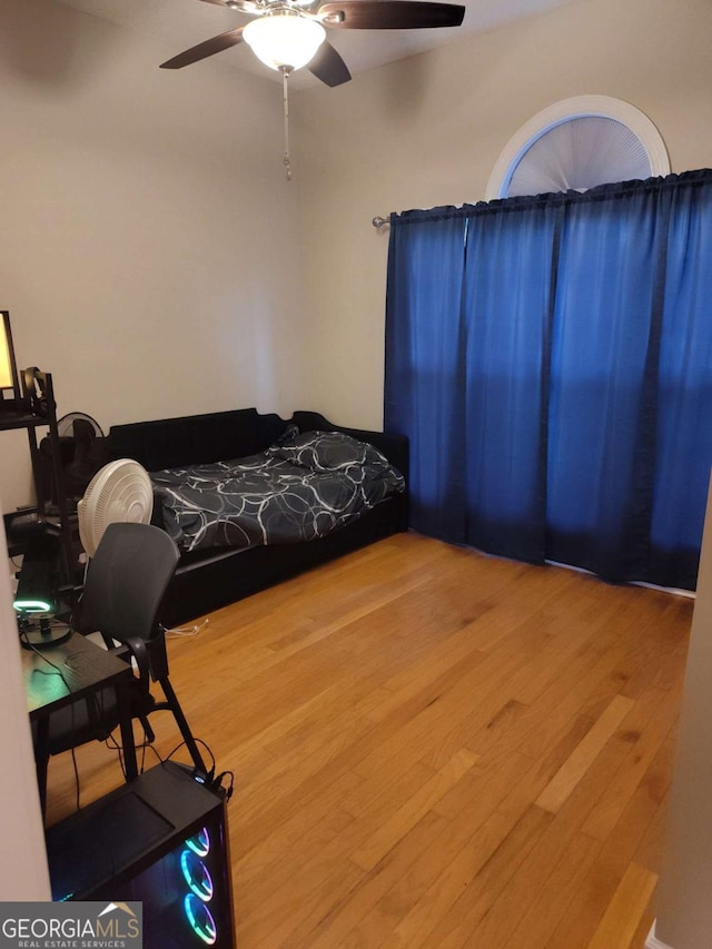 145 Spring Lake Cir, Brunswick, GA 31525 - bedroom featuring ceiling fan and wood finished floors