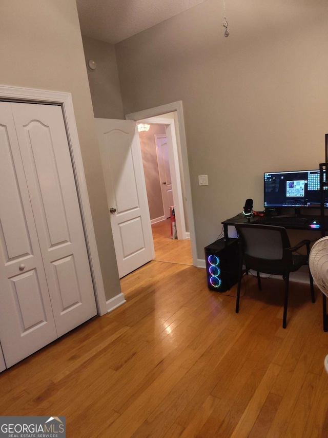 145 Spring Lake Cir, Brunswick, GA 31525 - home office featuring light wood-style flooring and baseboards