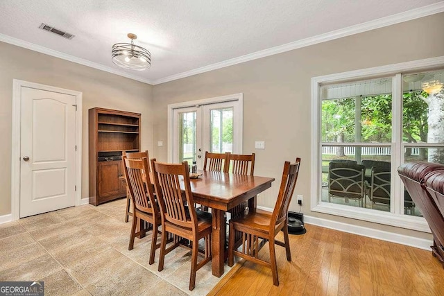 145 Spring Lake Cir, Brunswick, GA 31525 - dining space featuring french doors, baseboards, ornamental molding, and visible vents