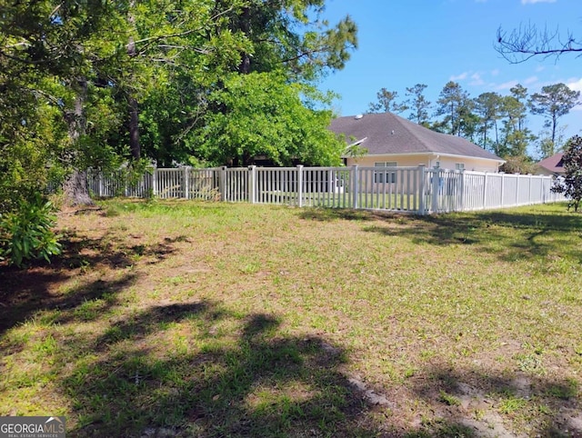 145 Spring Lake Cir, Brunswick, GA 31525 - view of yard with fence