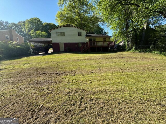 6695 Cedar Hurst Trl, Atlanta, GA 30349 - view of yard with a carport and a deck