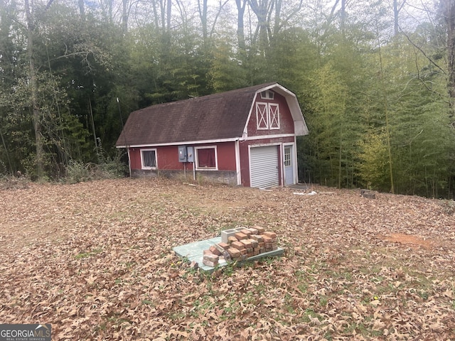 826 Nelson St, Jackson, GA 30233 - view of barn with a view of trees