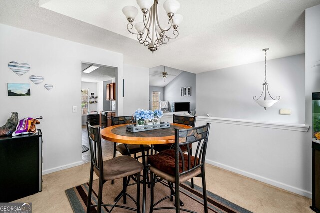 33 Blue Springs Way, Dallas, GA 30157 - dining room with light colored carpet, baseboards, a chandelier, a ceiling fan, and a textured ceiling