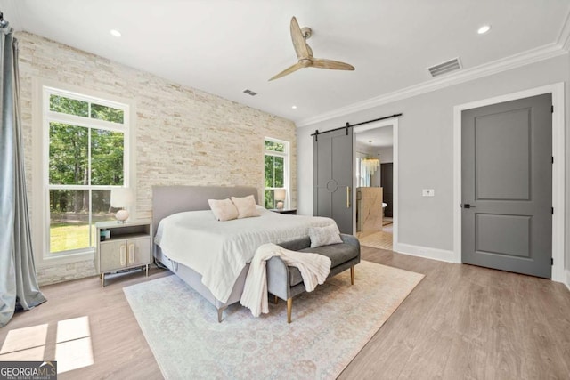 1472 Grizzle Rd, Dawsonville, GA 30534 - bedroom featuring a barn door, wood finished floors, baseboards, crown molding, and ceiling fan