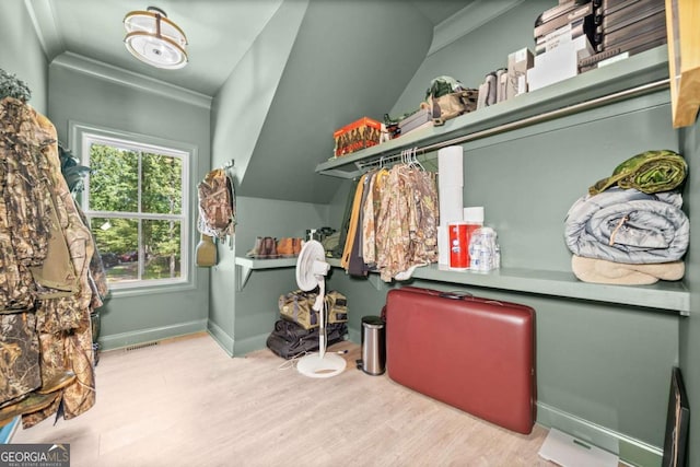 1472 Grizzle Rd, Dawsonville, GA 30534 - laundry room featuring crown molding and wood finished floors